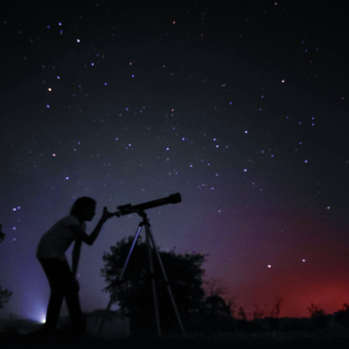 My daughter looking at a planet